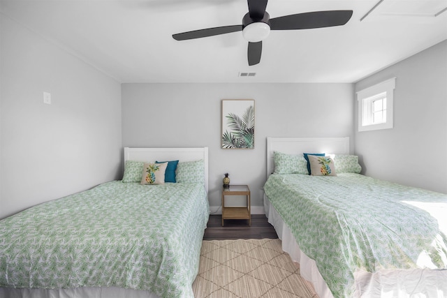 bedroom with visible vents and ceiling fan