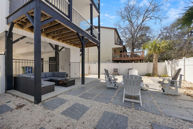 view of patio featuring outdoor lounge area and a fenced backyard