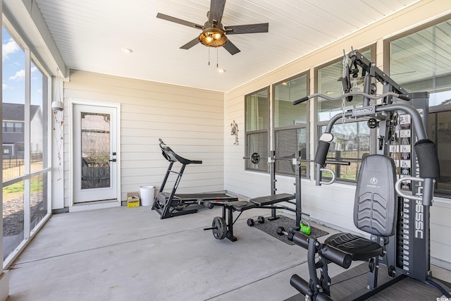 workout room with a ceiling fan