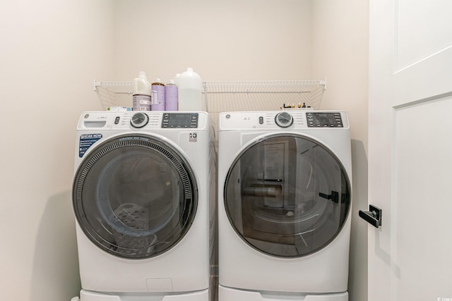 laundry area featuring laundry area and independent washer and dryer