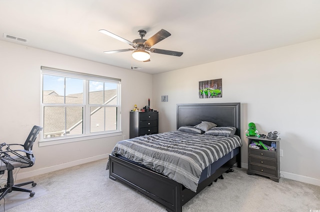 bedroom with visible vents, ceiling fan, baseboards, and carpet floors