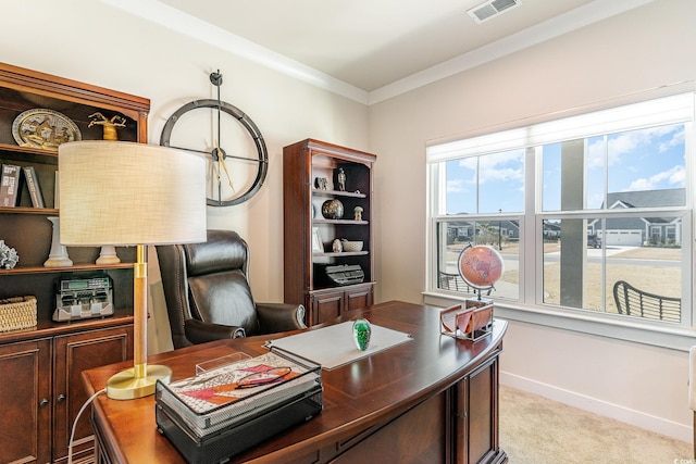 home office featuring visible vents, light carpet, baseboards, and crown molding