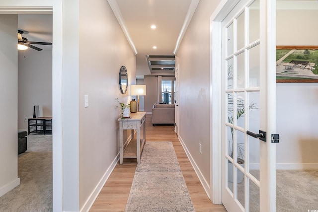 corridor with recessed lighting, baseboards, and ornamental molding