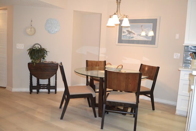 140 Spanish Oak Ct Unit 1, Surfside Beach, SC 29575 - dining space featuring light wood-style flooring and baseboards