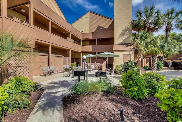 view of community with a patio area