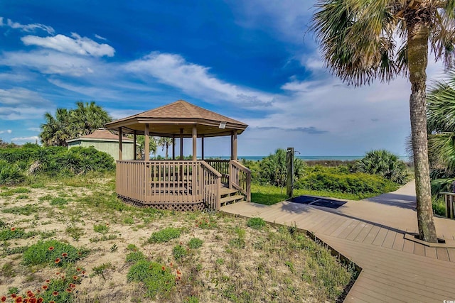 exterior space featuring a gazebo and a wooden deck