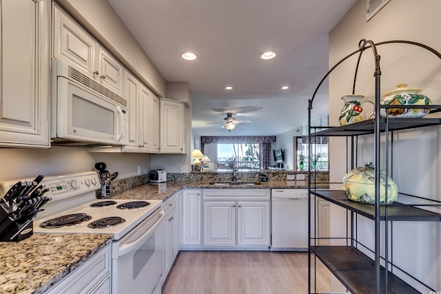 kitchen with ceiling fan, light wood-type flooring, recessed lighting, white appliances, and a sink