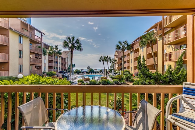 balcony with outdoor dining area