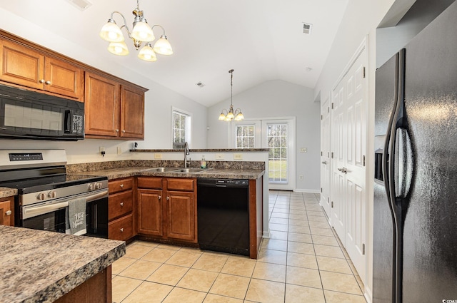 kitchen featuring light tile patterned floors, visible vents, a sink, black appliances, and a chandelier