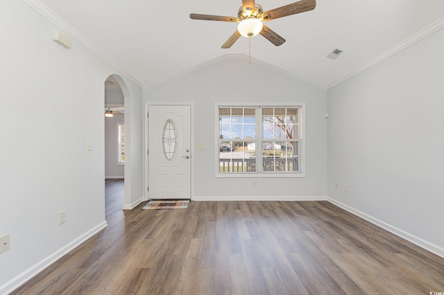 foyer entrance featuring crown molding, wood finished floors, visible vents, and ceiling fan