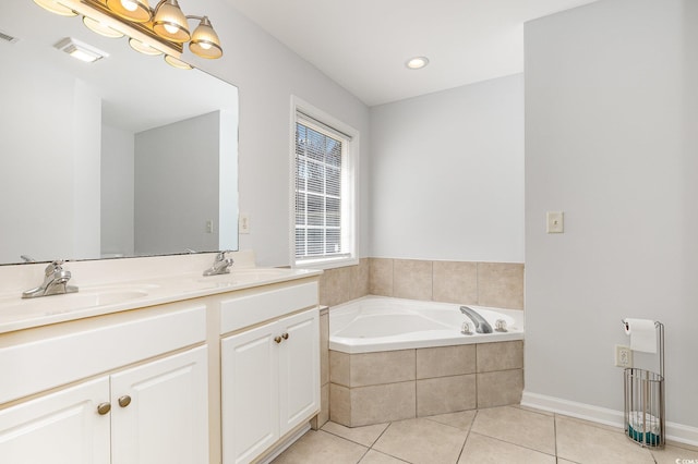 bathroom with tile patterned flooring, double vanity, a bath, and a sink