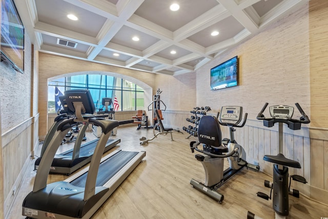 workout area with visible vents, a wainscoted wall, coffered ceiling, wood finished floors, and recessed lighting