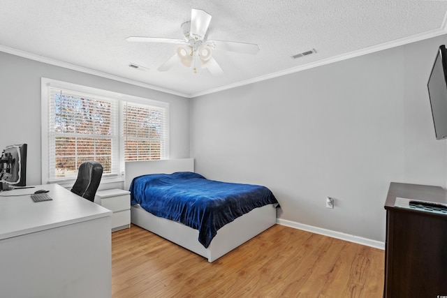 3763 Annandale Dr, Myrtle Beach, SC 29577 - bedroom with light wood finished floors, visible vents, and ornamental molding
