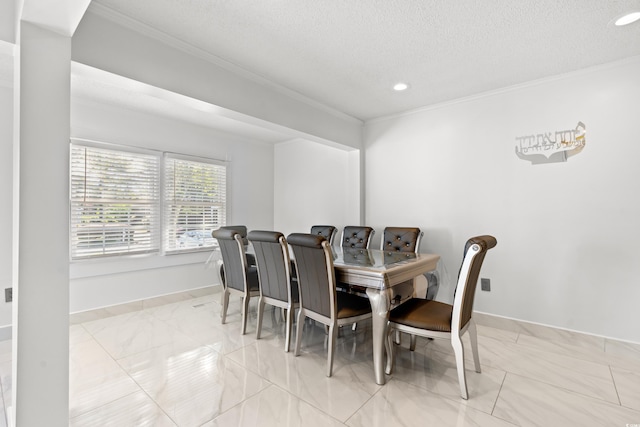 3763 Annandale Dr, Myrtle Beach, SC 29577 - dining room featuring baseboards, a textured ceiling, and ornamental molding