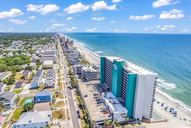 bird's eye view with a view of the beach and a water view