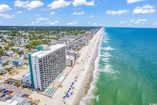 bird's eye view featuring a beach view and a water view