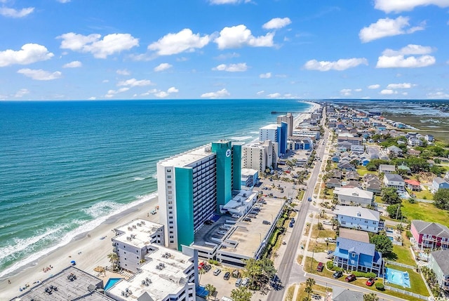 bird's eye view with a view of the beach and a water view