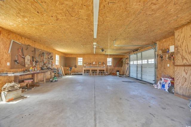4938 Trooper Ln, Loris, SC 29569 - garage with a workshop area and a garage door opener