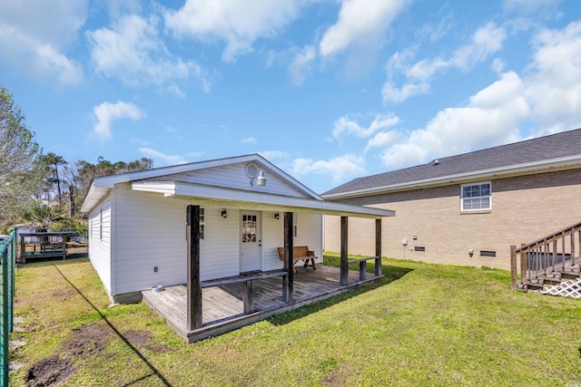 4938 Trooper Ln, Loris, SC 29569 - rear view of house with a lawn and a wooden deck