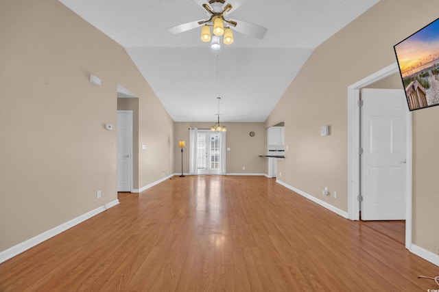 4938 Trooper Ln, Loris, SC 29569 - unfurnished living room featuring lofted ceiling, a ceiling fan, light wood finished floors, and baseboards