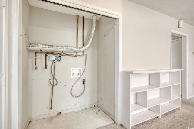 interior space with washer hookup and laundry area