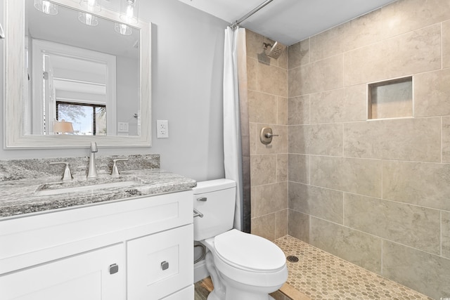 601 Mitchell Dr Unit 203, Myrtle Beach, SC 29577 - full bath featuring a tile shower, toilet, and vanity