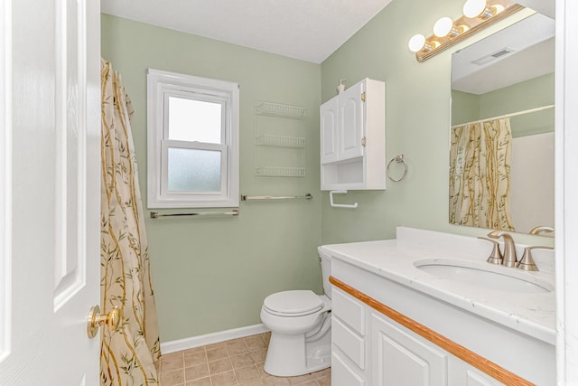 bathroom with visible vents, baseboards, toilet, tile patterned floors, and vanity