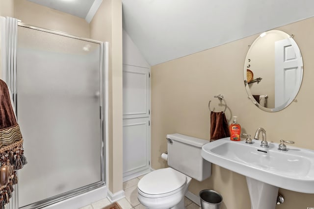 full bathroom with vaulted ceiling, a stall shower, toilet, and a sink