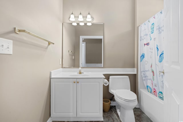 bathroom featuring shower / bath combo with shower curtain, toilet, and vanity