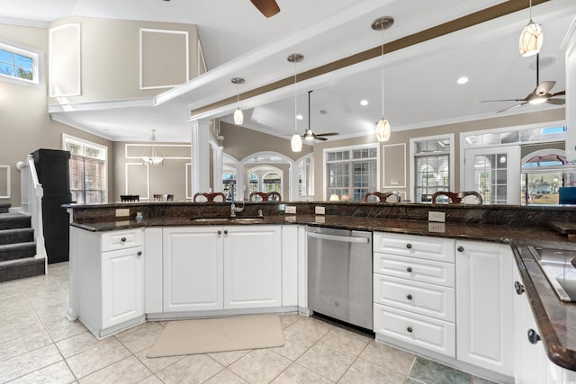 kitchen with a sink, ornamental molding, a ceiling fan, and stainless steel dishwasher