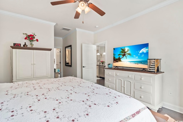 bedroom with visible vents, wood finished floors, crown molding, baseboards, and ceiling fan