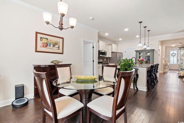 dining space with crown molding, baseboards, recessed lighting, a notable chandelier, and dark wood-style flooring