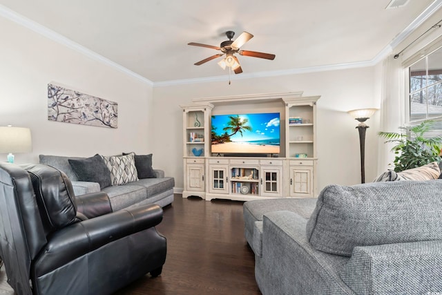 living area with dark wood finished floors, a ceiling fan, and ornamental molding