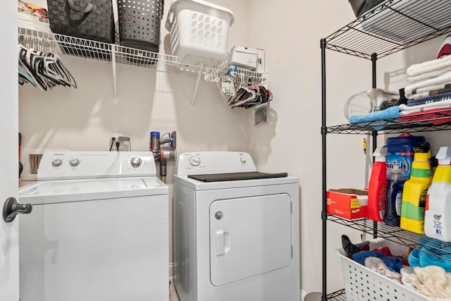 laundry area featuring washer and dryer and laundry area