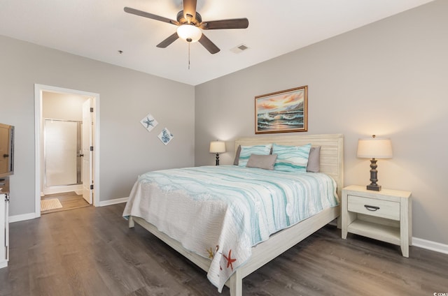 bedroom featuring dark wood finished floors, visible vents, and baseboards