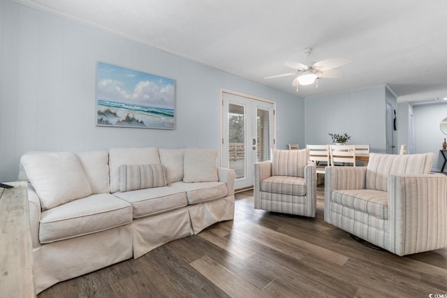 living area featuring ceiling fan, french doors, wood finished floors, and ornamental molding