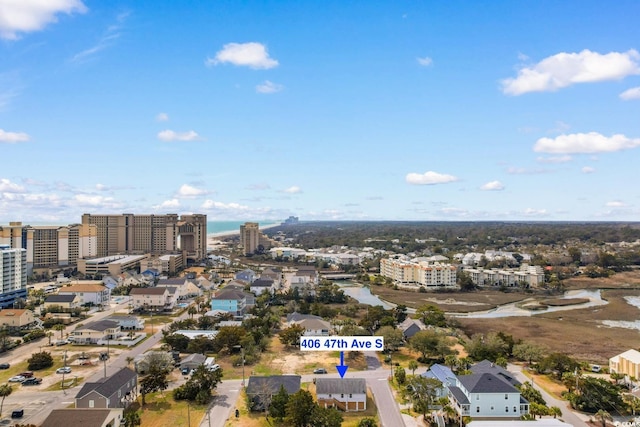 drone / aerial view with a view of city