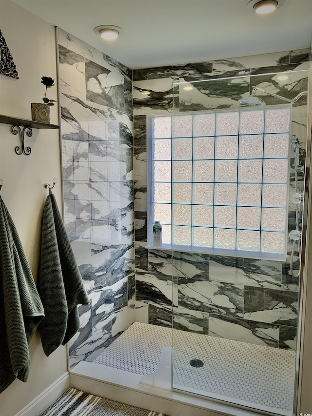 bathroom featuring a shower stall