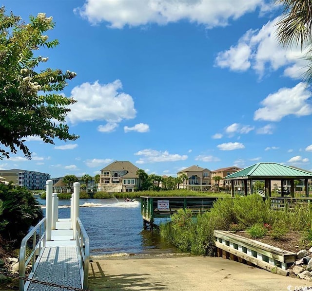 dock area with a water view