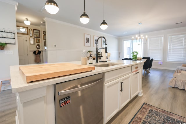 780 Old Murrells Inlet Rd, Murrells Inlet, SC 29576 - kitchen with stainless steel dishwasher, a sink, crown molding, an island with sink, and white cabinetry