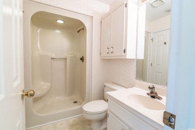 full bath featuring toilet, a stall shower, wallpapered walls, and vanity