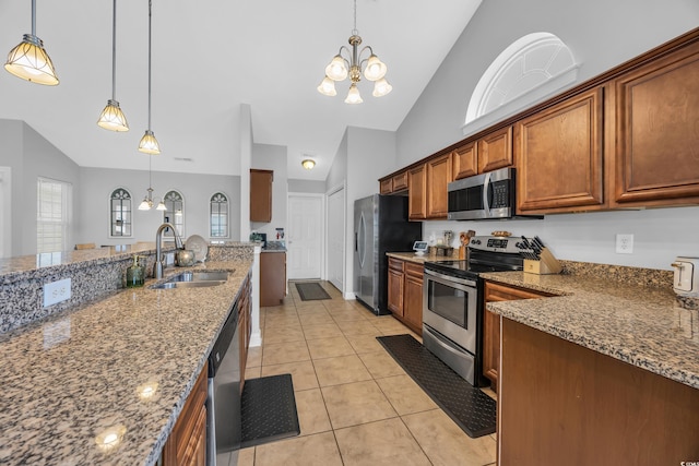 216 Camrose Way, Myrtle Beach, SC 29579 - kitchen featuring appliances with stainless steel finishes, a chandelier, high vaulted ceiling, and pendant lighting