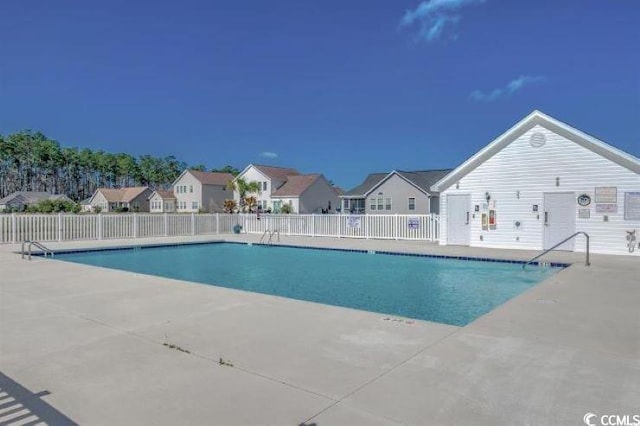 216 Camrose Way, Myrtle Beach, SC 29579 - community pool featuring a patio and a residential view