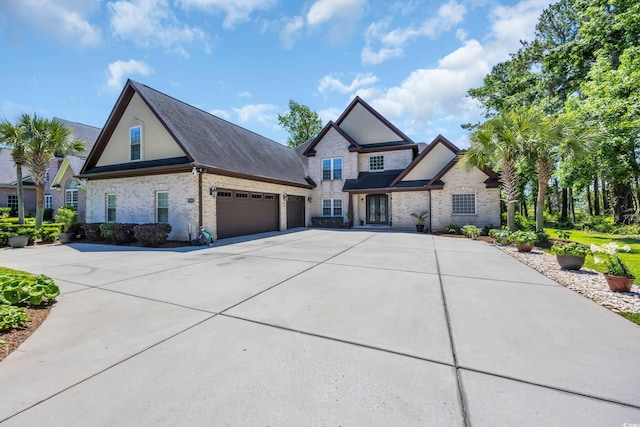 9785 Anchor Dr, Longs, SC 29568 - view of front of property with concrete driveway, brick siding, and an attached garage