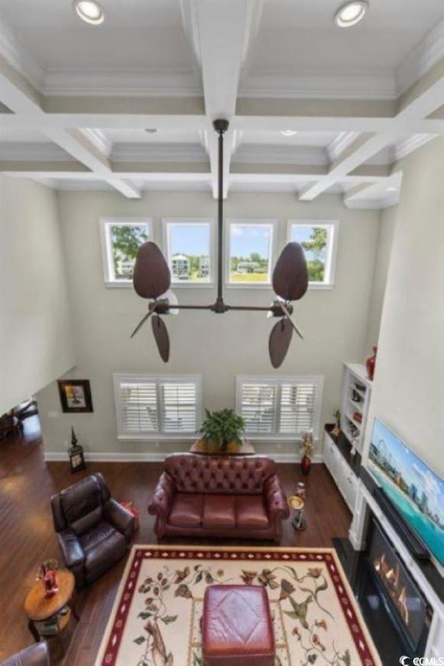 9785 Anchor Dr, Longs, SC 29568 - living area with coffered ceiling, wood finished floors, beam ceiling, plenty of natural light, and recessed lighting