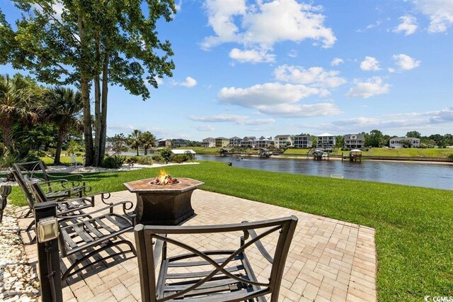 9785 Anchor Dr, Longs, SC 29568 - view of patio featuring an outdoor fire pit, a water view, and a residential view