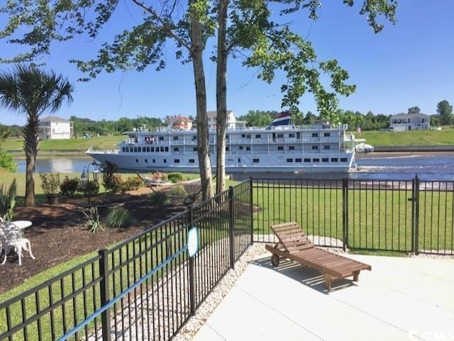 9785 Anchor Dr, Longs, SC 29568 - view of patio with a water view and a dog friendly area