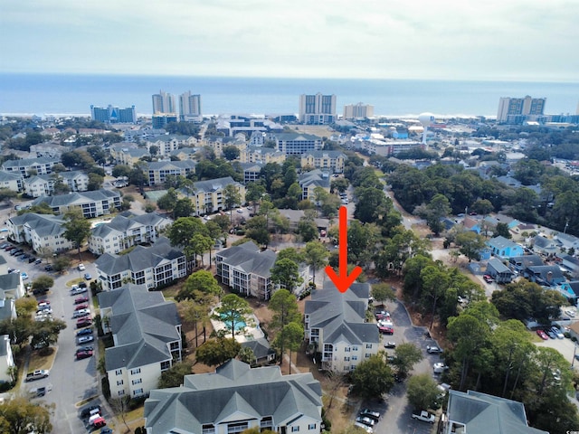 drone / aerial view with a view of city and a water view