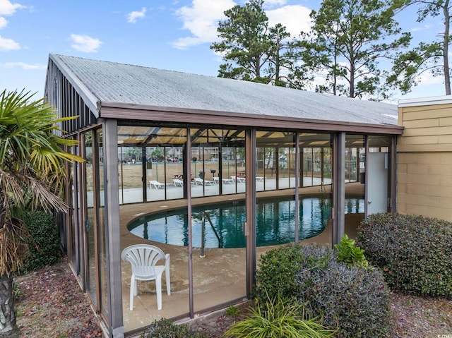 view of dock with a community pool