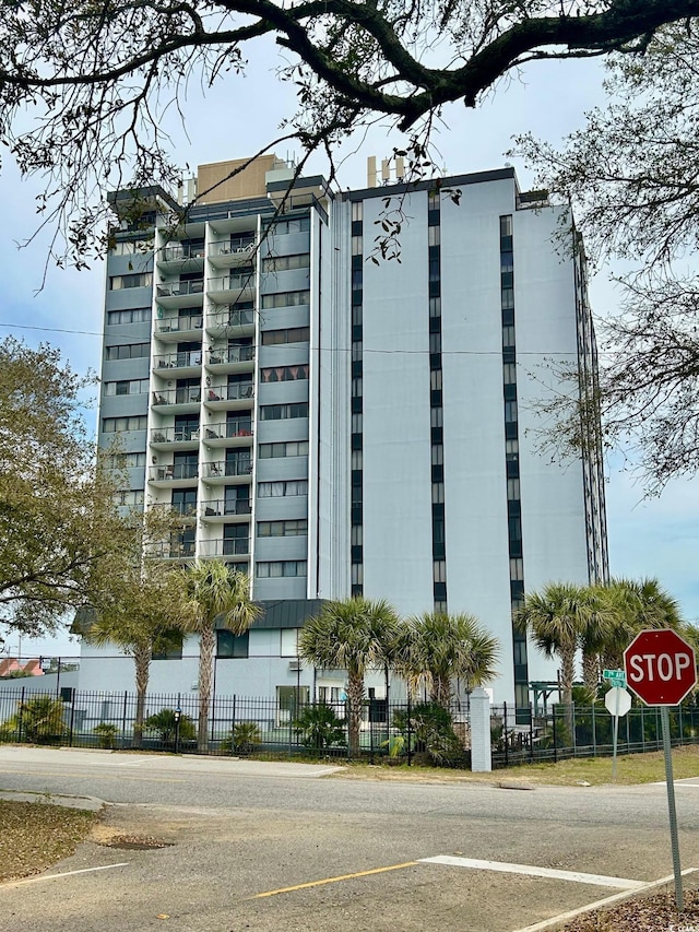 view of property featuring a fenced front yard